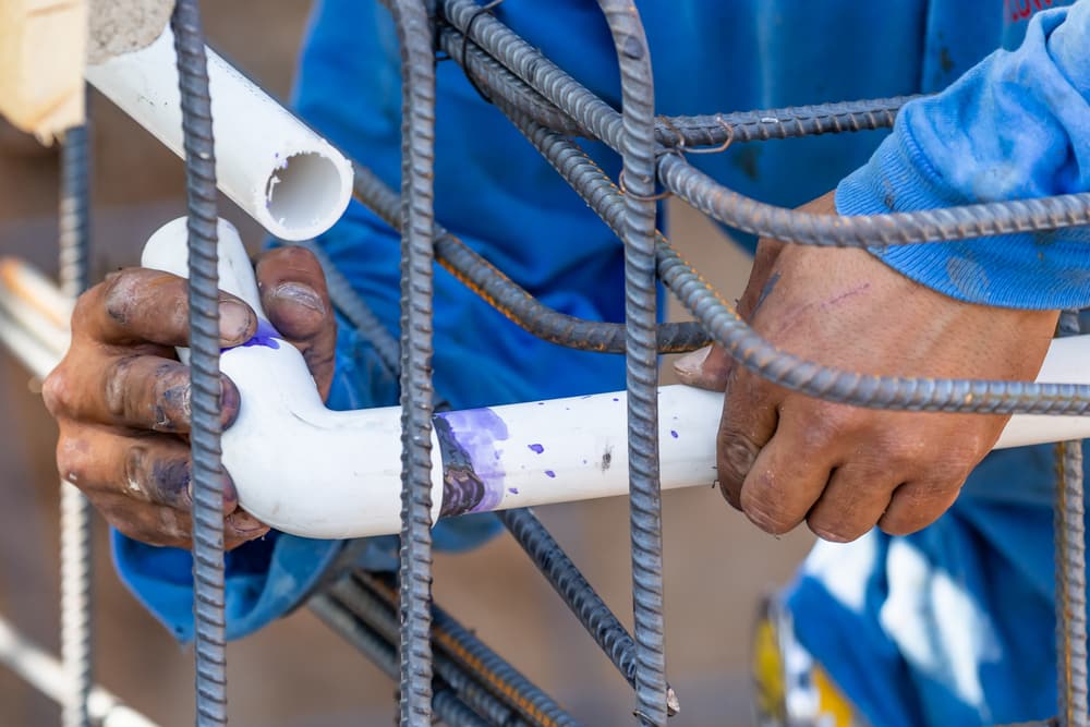 Monroe Plumber Installing Pipes